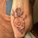 skull and rose fine line tattoo by Bella