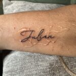 custom name tattoo fine line by bella